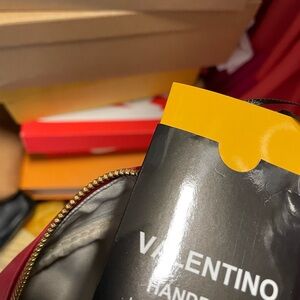 Authentic Valentino crossbody bag, Red and had been worn slightly